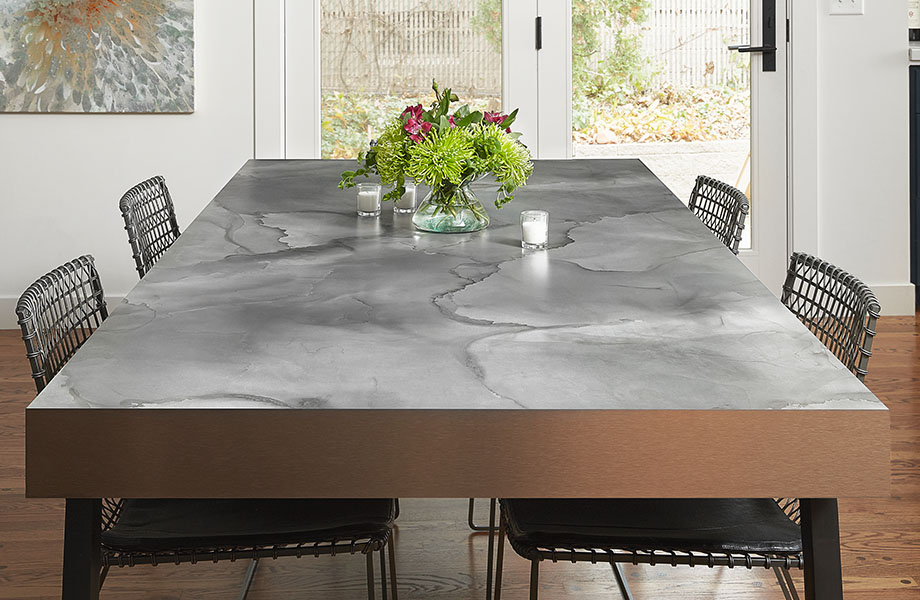 At first blush, watercolors and tempered steel seem to have nothing in common, but the pairing ignites a surprising element of artistry and chic, industrial design. This stormy blend of warm and cool grays with a touch of blue and charcoal black is just the right coloration for the moody and inky tones of many modern interiors. Watercolor Steel shows what can happen when we allow ourselves to explore new media and push design boundaries.
